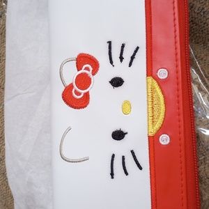 Hello Kitty wallet. New in package.